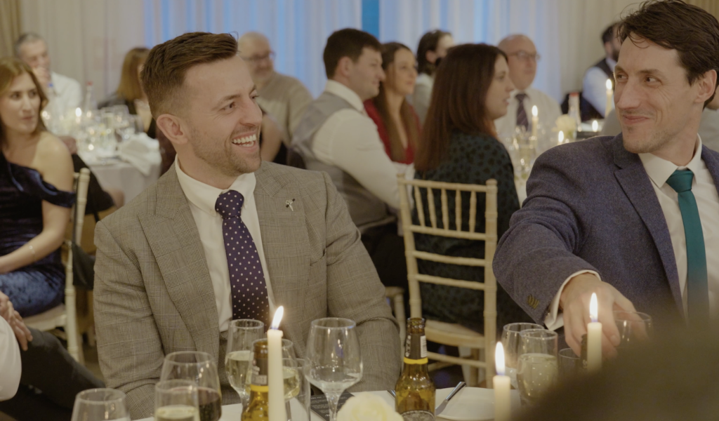 Guest Laughing At Wedding Speech