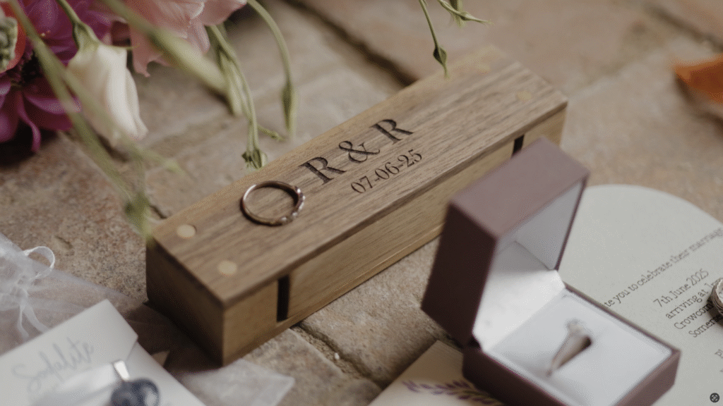 Rich & Ria's wedding ring box with R&R printed on the top