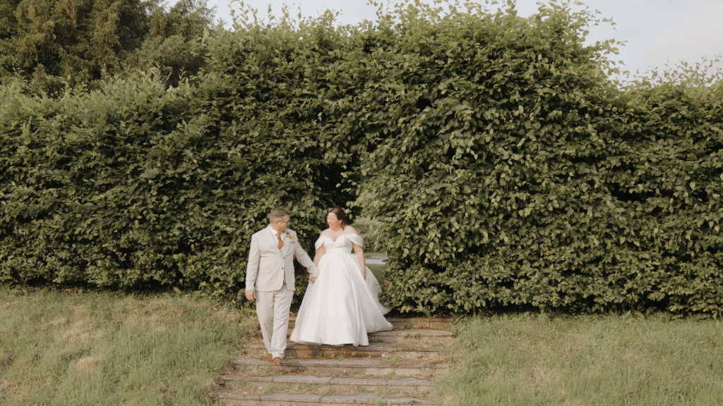 Rich and Ria taking a stroll hand in hand through the grounds of Crowcombe Court, Somerset