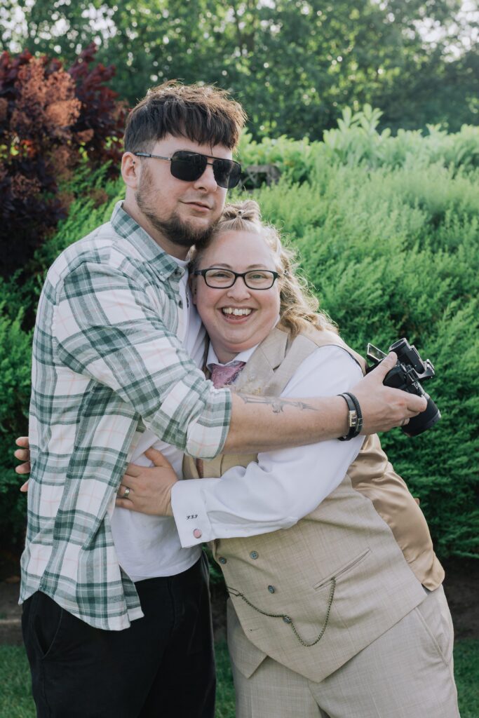 hugs from wedding videographer Chris at diamond film